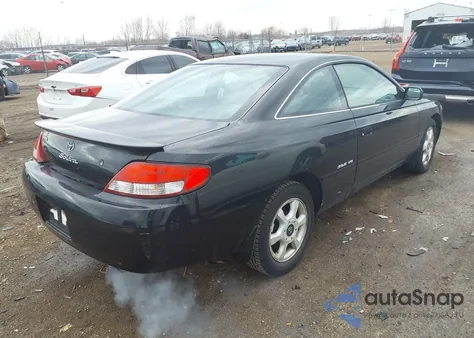 1999 Toyota Camry Solara Sle z USA, uszkodzony, nr VIN 2T1CF22P2XC252320
